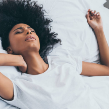 Woman having morning neck pain