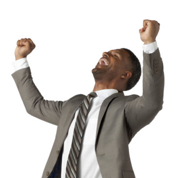 Portrait of happy black businessman against white background