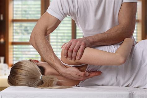 Chiropractor adjusting a woman