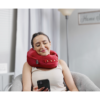 person texting while wearing comfortable neck supporting pillows for sleeping travel spine support - burgundy