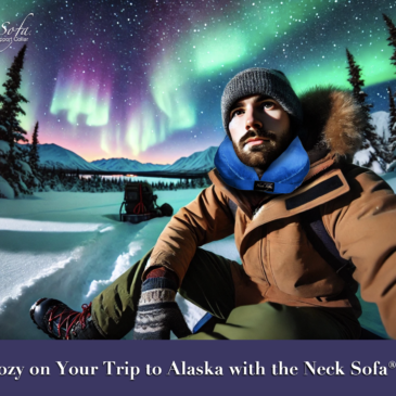 Image with the traveler's face clearly visible as he looks forward under the Northern Lights in Alaska wearing a Neck Sofa Pillow.