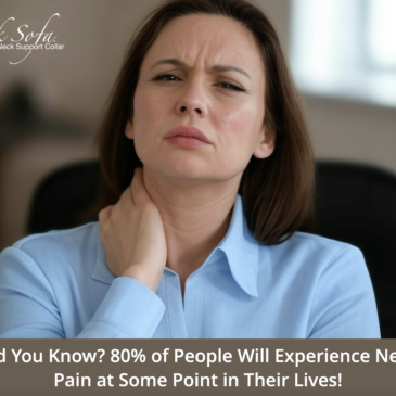 A woman sitting down rubbing her neck because she has neck pain