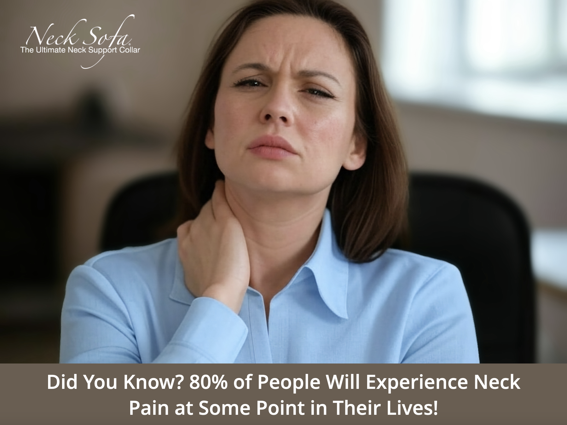 A woman sitting down rubbing her neck because she has neck pain