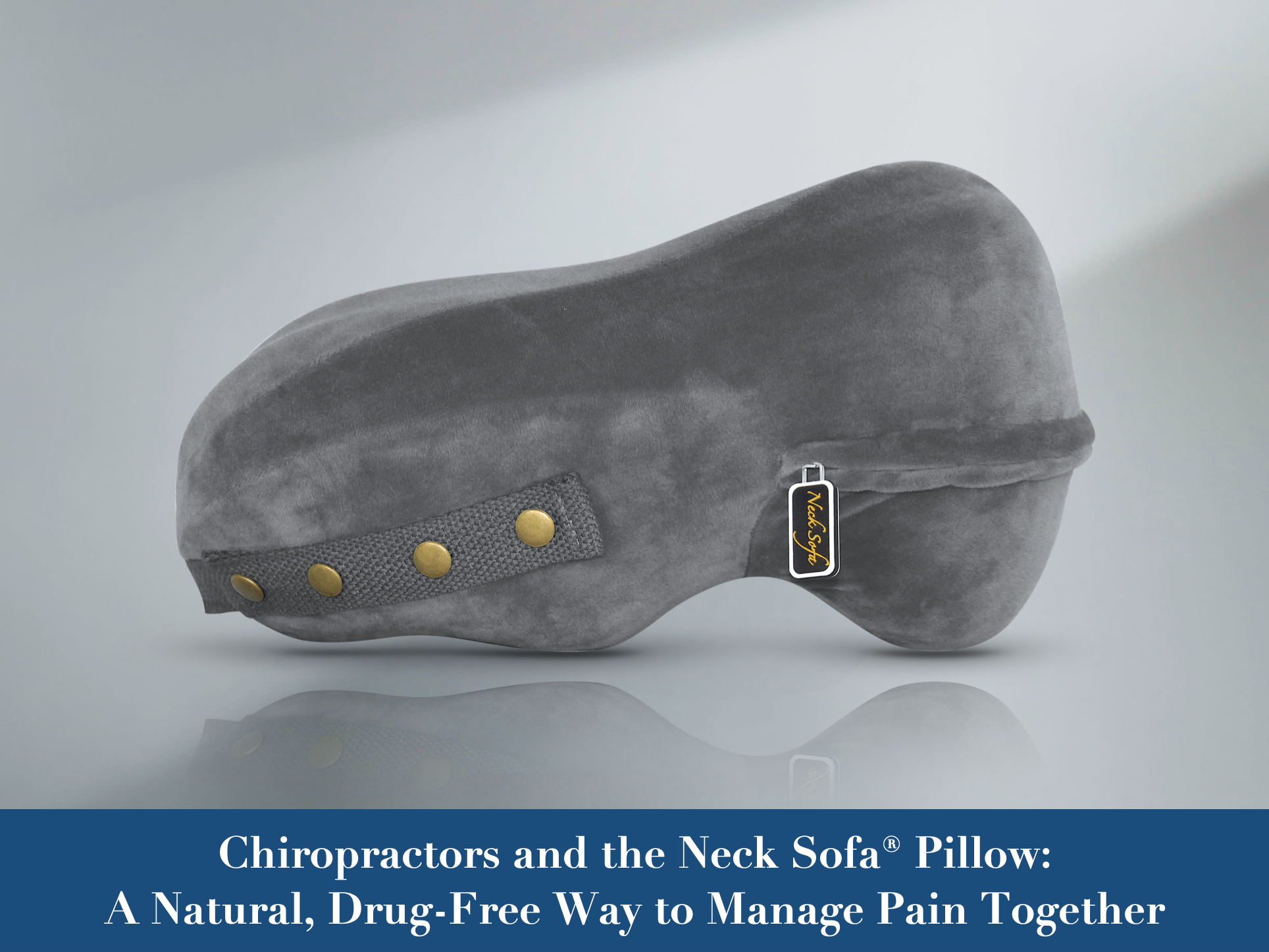 Picture of the side view oof a grey Neck Sofa pillow resting on a table. A Natural, Drug-Free Way to Manage Pain Together